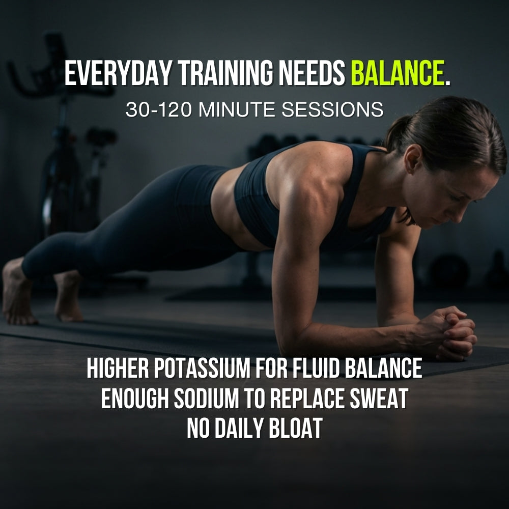 A woman doing a plank in her home gym setup.