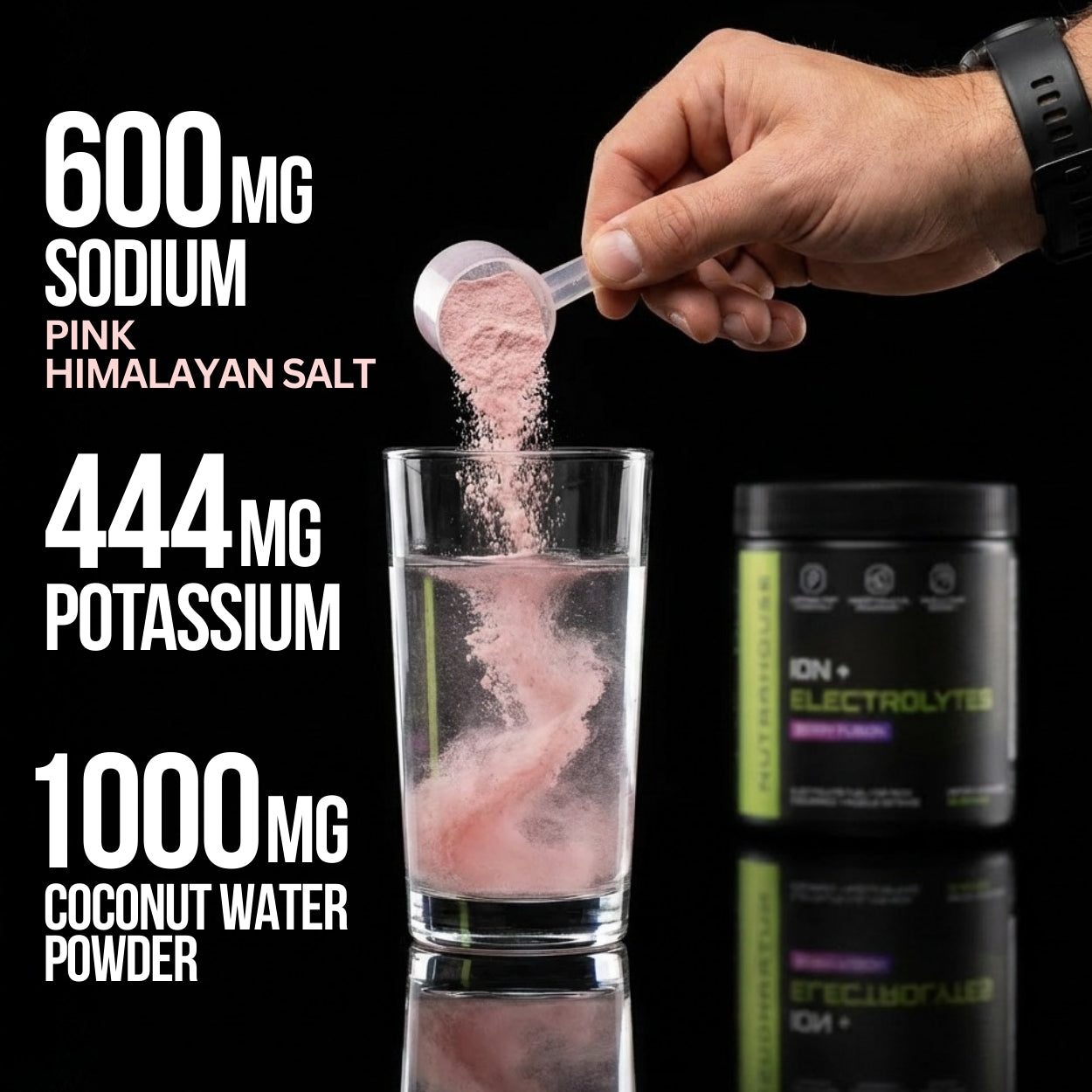 Person adding a scoop of pink powder to a glass with electrolyte NUTRAHOUSE supplement container in the background.